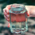 kelly holding bottle clear effluent_300dpi