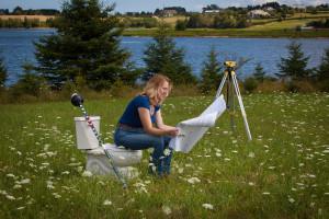 ETC President, Kelly Galloway, P.Eng., looks over some engineering plans.